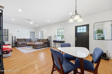 Rare opportunity to own a beautifully renovated duplex in the - photo 6