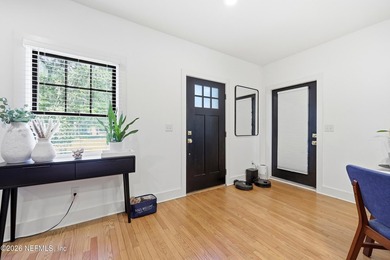 Rare opportunity to own a beautifully renovated duplex in the - photo 8
