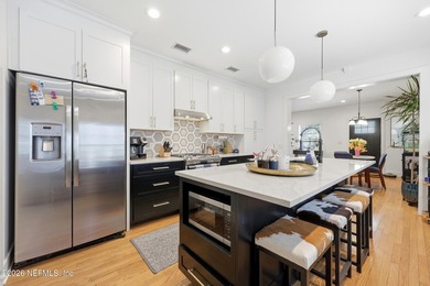 Rare opportunity to own a beautifully renovated duplex in the - photo 10