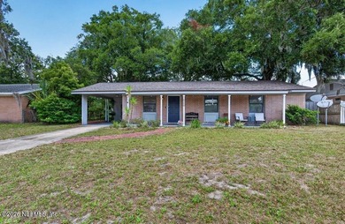 Welcome home to this charming brick beauty nestled on an - photo 3