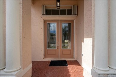 Price improvement! This stunning LAKEFRONT 3BR/2BA/2CG + den - photo 4
