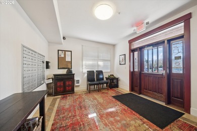 Top-floor, end-unit condo offering added privacy, natural light