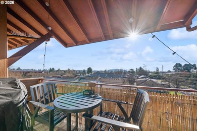 Top-floor, end-unit condo offering added privacy, natural light