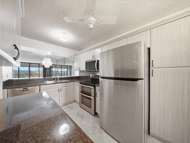 Enjoy beautiful water views and total peace of mind from this - photo 7