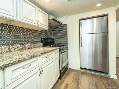 Built in 1915, this cherished Legal 2 family row house in the - photo 27