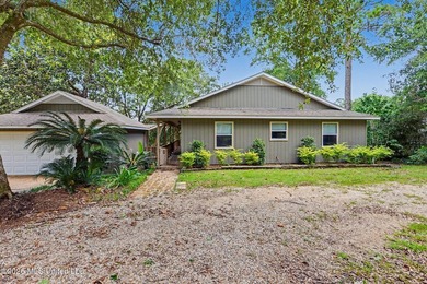 Nestled along the scenic Pascagoula River, this beautiful - photo 1