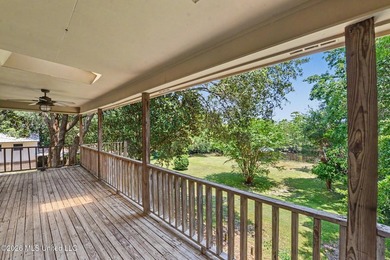 Nestled along the scenic Pascagoula River, this beautiful - photo 3