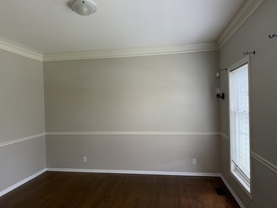This Colonial style residence presents four bedrooms and two and - photo 3