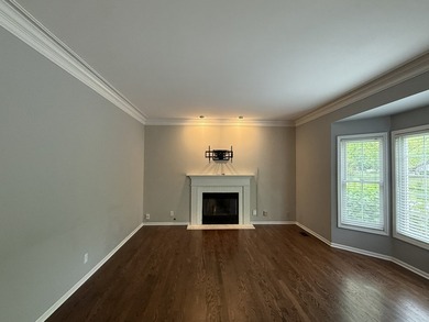 This Colonial style residence presents four bedrooms and two and - photo 6