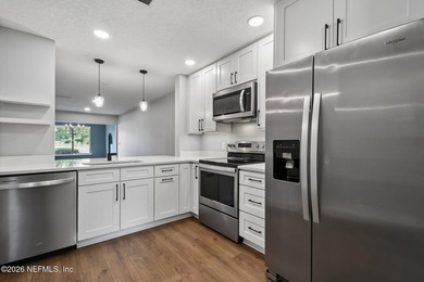This beautifully renovated 2-bedroom, 2-bath ground-floor condo - photo 13