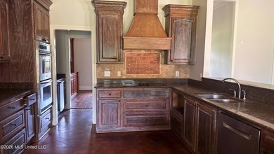 Nestled on approximately 2 acres in the desirable gated - photo 2