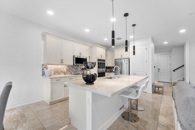 Experience effortless East Boca living in this meticulously - photo 8