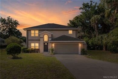 Nestled on a quiet cul-de-sac, this original-owner, custom-built - photo 2
