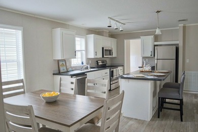 This Brand New Model Home is A Must-See and includes 6 Months - photo 6