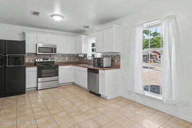 Pristine and move-in ready in the heart of Long Beach! Pride of - photo 7