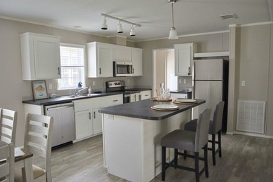 This Brand New Model Home is A Must-See and includes 6 Months - photo 10