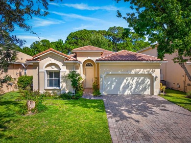 This 3BD/2BA CBS home is located in the gated community of - photo 1