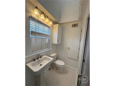 This beautifully updated 2 or 3-bedroom, 1 bathroom home is a - photo 7