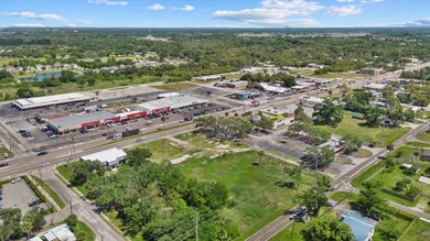 610 N US Hwy 41 lot is 104 feet by 173 ft deep; North Lot on 1st - photo 3