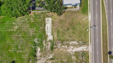 610 N US Hwy 41 lot is 104 feet by 173 ft deep; North Lot on 1st - photo 8
