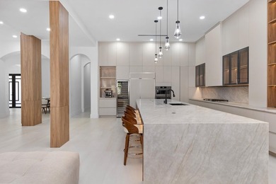 This classic Mediterranean estate in The Oaks has been - photo 9