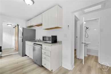 627 W 48th St - photo 8