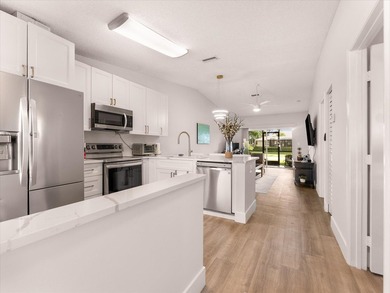 Beautiful 2/2 all updated Villa at gated community 55+ Whisper - photo 1