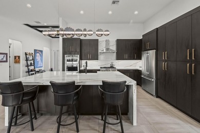 Experience the pinnacle of luxury living in this breathtaking - photo 7