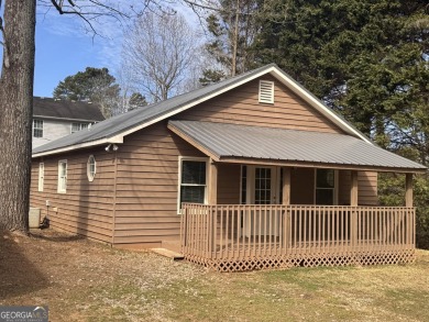 Lake Home For Sale in Cumming, Georgia