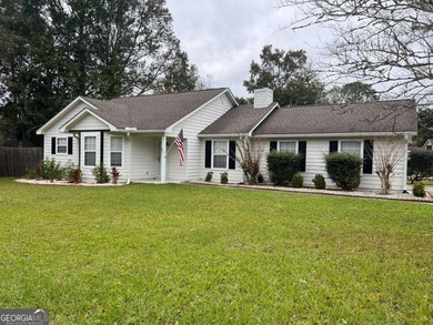 A beautifully updated 3 bedroom, 2 bath home located in the - photo 1