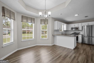 A beautifully updated 3 bedroom, 2 bath home located in the - photo 8