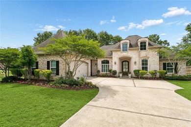 Situated in The Landings subdivision, this all-brick - photo 1