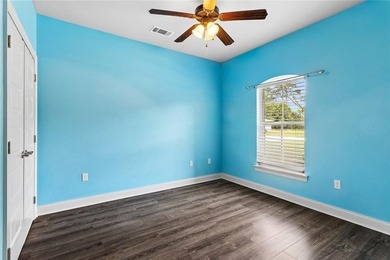 Situated in The Landings subdivision, this all-brick - photo 9