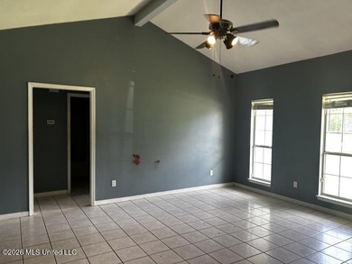 This property features 3 bedrooms and 2 bathrooms. Covered back - photo 4
