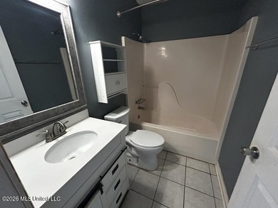 This property features 3 bedrooms and 2 bathrooms. Covered back - photo 5