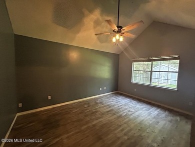 This property features 3 bedrooms and 2 bathrooms. Covered back - photo 8