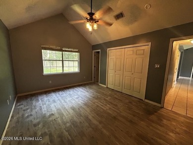 This property features 3 bedrooms and 2 bathrooms. Covered back - photo 9