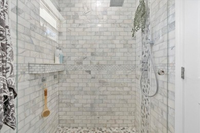 Welcome to this charming 4-bedroom 2-bath home situated in the - photo 27