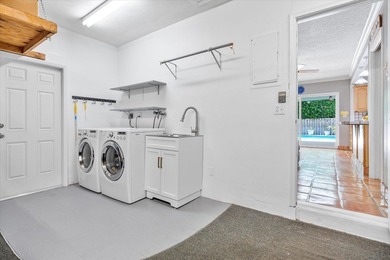 Welcome to this charming 4-bedroom 2-bath home situated in the - photo 32