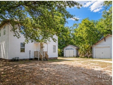 Solid duplex opportunity on a spacious corner lot with real - photo 2