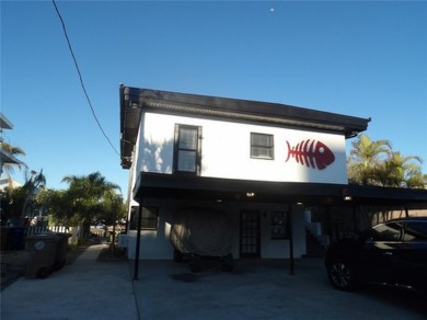 waterfront on the wide open canal, located in Madeira Beach - photo 29