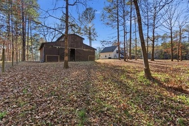 Behind a gated entrance, a private drive opens to five acres of - photo 20
