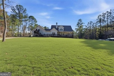 Behind a gated entrance, a private drive opens to five acres of - photo 30
