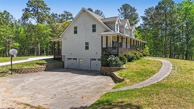 Behind a gated entrance, a private drive opens to five acres of - photo 32