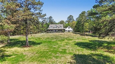 Behind a gated entrance, a private drive opens to five acres of - photo 34