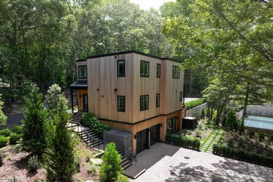 Offered fully furnished, this newly constructed contemporary - photo 1
