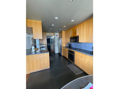 Experience the Brickell Key lifestyle in this spacious 3-bedroom - photo 11
