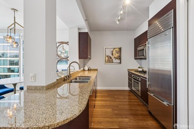 Back on market, One Rincon Hill where iconic views, exquisite - photo 13