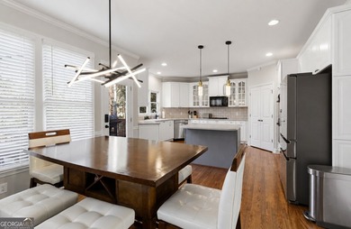 This gorgerous estate home is located in the highly sought-after - photo 4