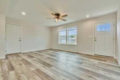 Discover the ease of single-level living in this beautifully - photo 3